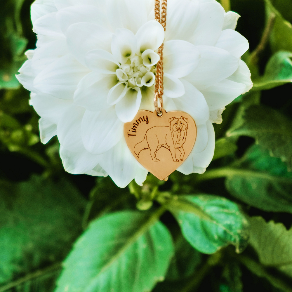 Goldener Schmuck mit Hund Yorkshire Terrier