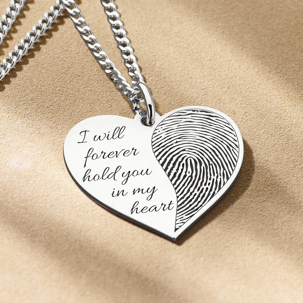 Schmuck mit Fingerabdruck in Herzform aus Silber